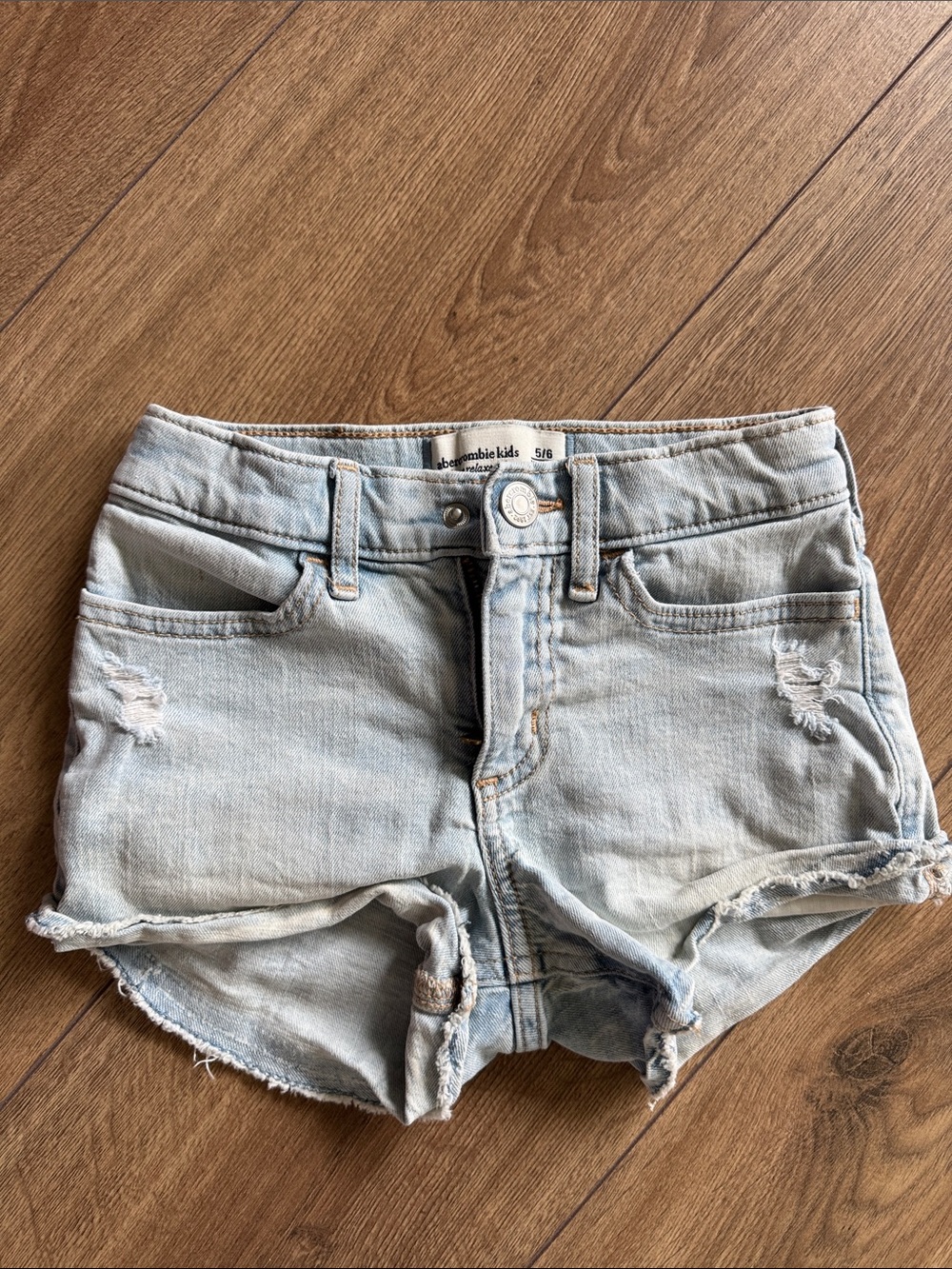 abercrombie kids faded light blue distressed denim shorts